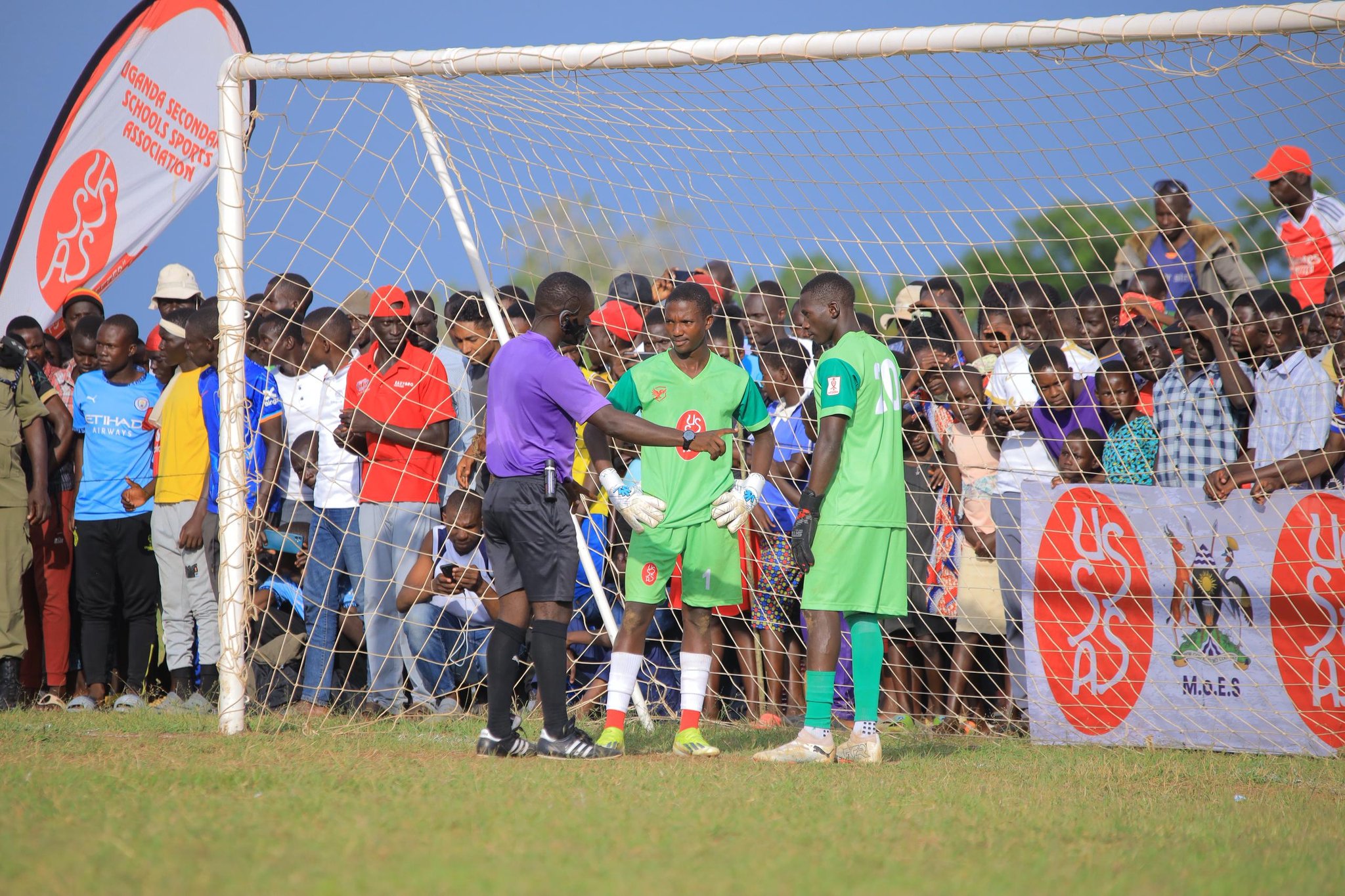Both goalkeepers paying keen attentions as the referee briefs them of the penalty guidelines